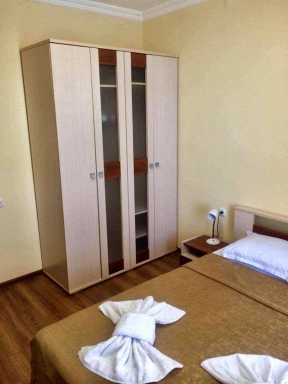 Postel nebo postele na pokoji v ubytování Hotel Medusa