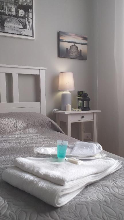 Łóżko lub łóżka w pokoju w obiekcie Villa Vittorio