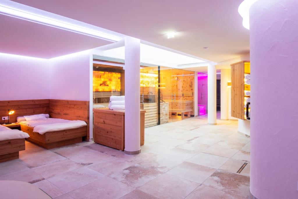 Postel nebo postele na pokoji v ubytování Hotel Anemone