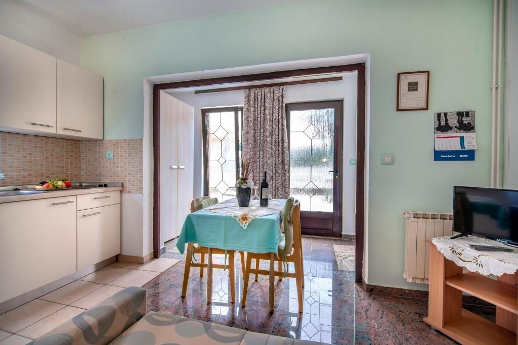 Kuchyň nebo kuchyňský kout v ubytování Apartments Vera Savic