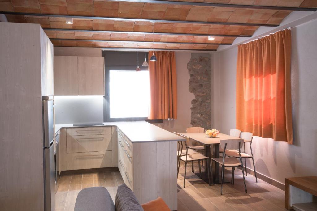 A seating area at Apartaments Cal Nunci-Apartament Cadí