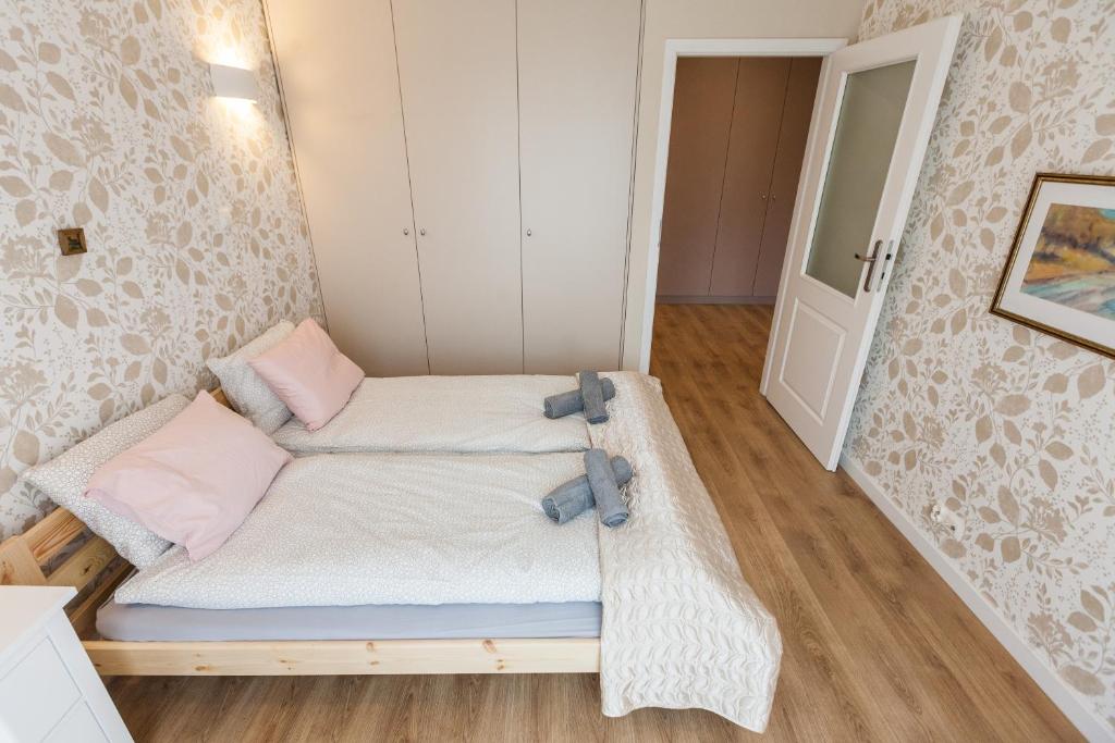 Posteľ alebo postele v izbe v ubytovaní Vintage Krasińskiego 7 Apartments