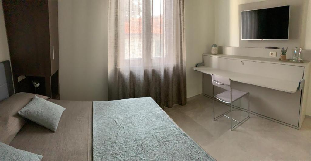 Postel nebo postele na pokoji v ubytování B&b estercarlo
