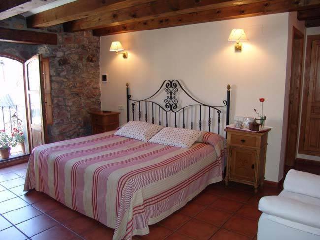 Postel nebo postele na pokoji v ubytování Casa Palacin