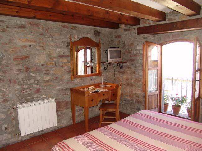 Postel nebo postele na pokoji v ubytování Casa Palacin