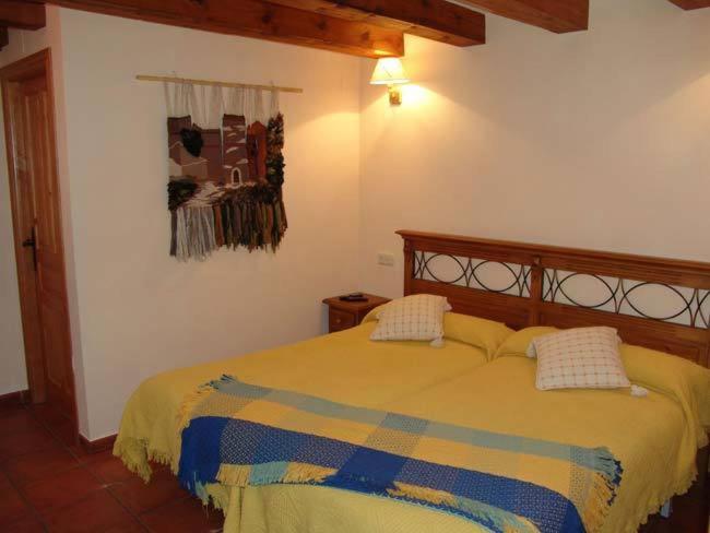 Postel nebo postele na pokoji v ubytování Casa Palacin