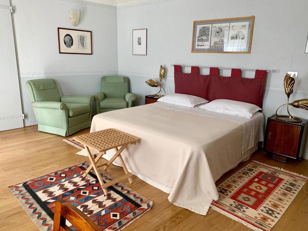 A bed or beds in a room at Villa Belforte