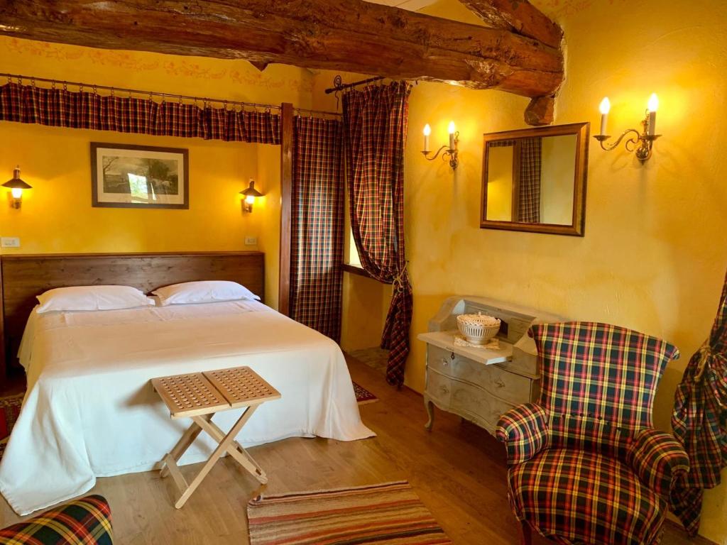 A bed or beds in a room at Villa Belforte