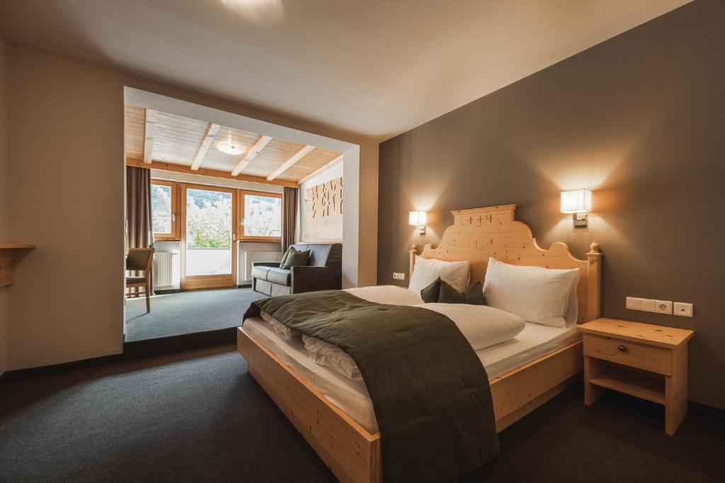 Posteľ alebo postele v izbe v ubytovaní Hotel Kesslwirt