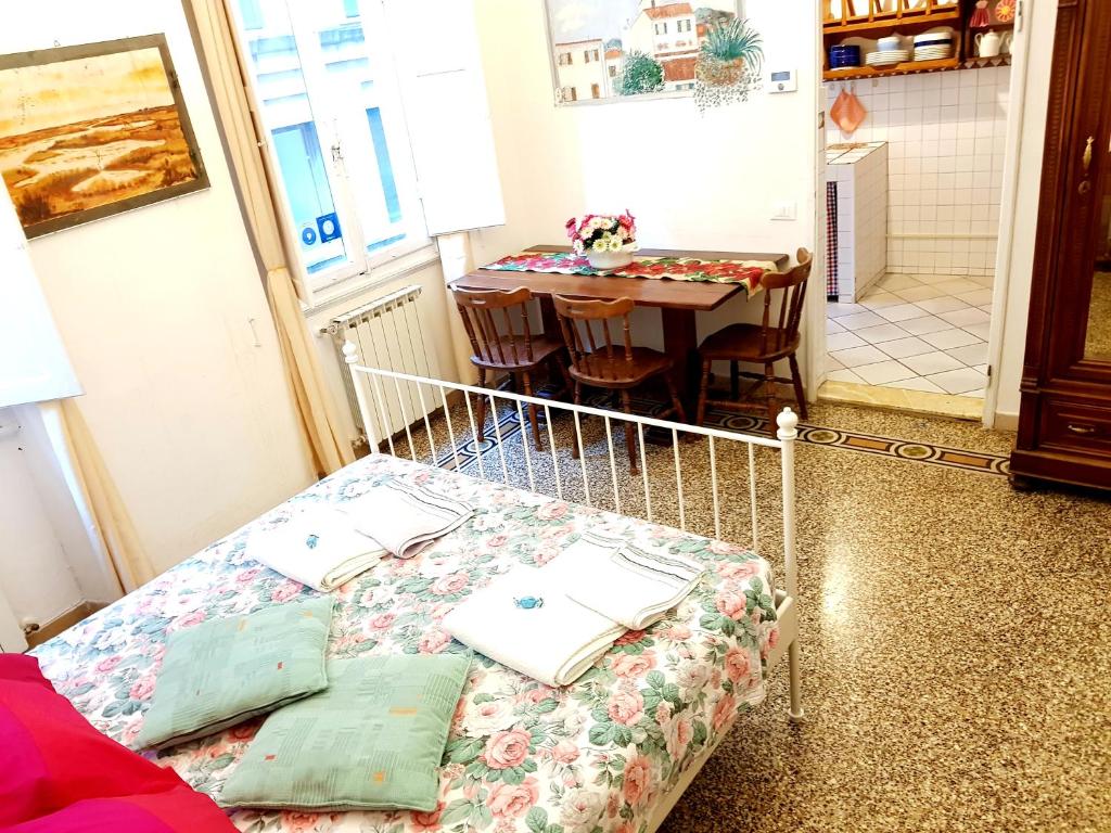 Posteľ alebo postele v izbe v ubytovaní Florence Signoria Apartment