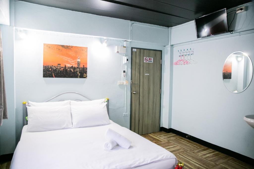 Postel nebo postele na pokoji v ubytování Bangkok Canale Home at Khaosarn