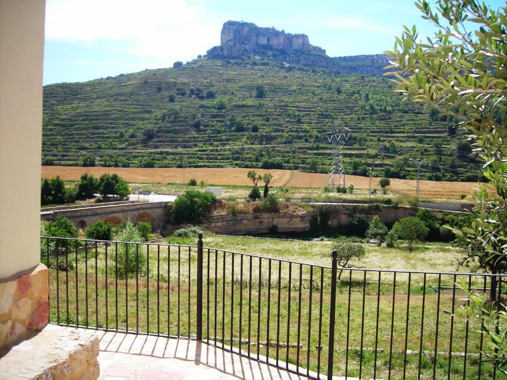 a view of a mountain from a fence at Cases Tonet in Forcall