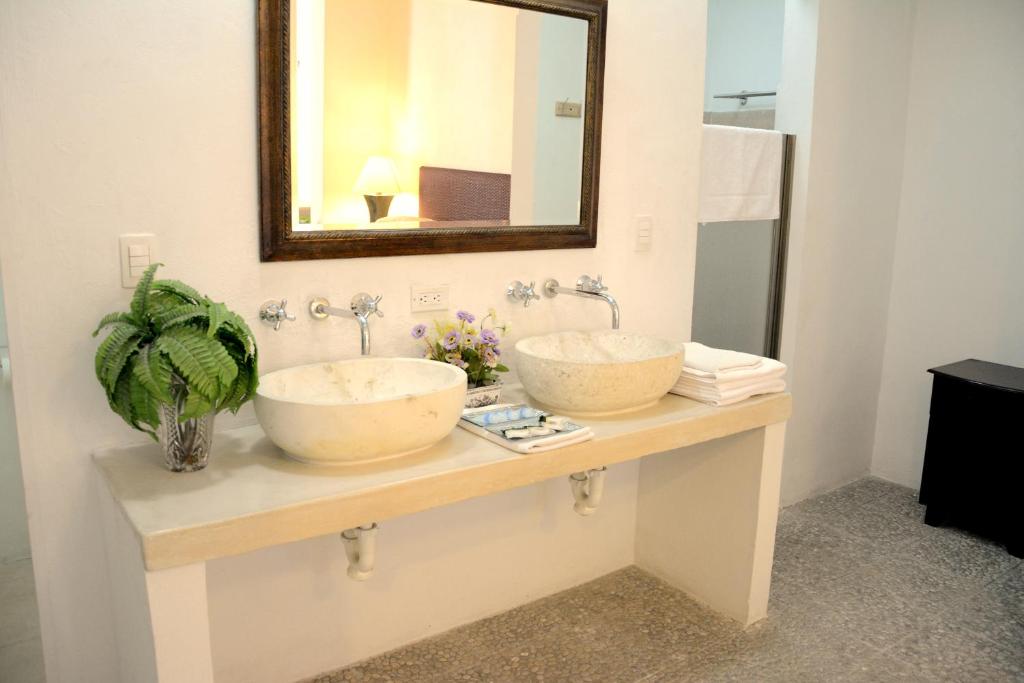 Koupelna v ubytování Hotel Mejorada Merida