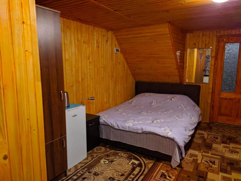 Postel nebo postele na pokoji v ubytování У Оксани