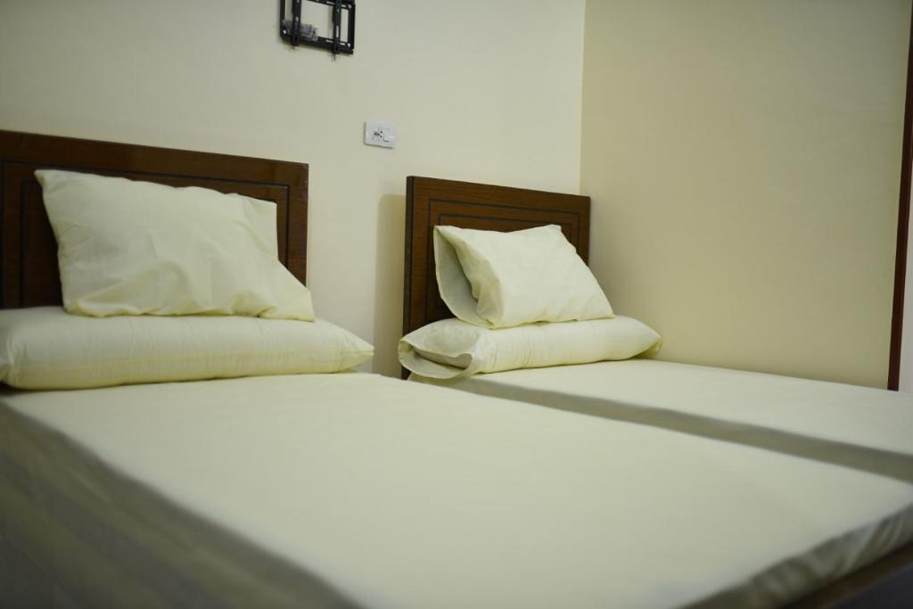 Postel nebo postele na pokoji v ubytování Kosh royal house