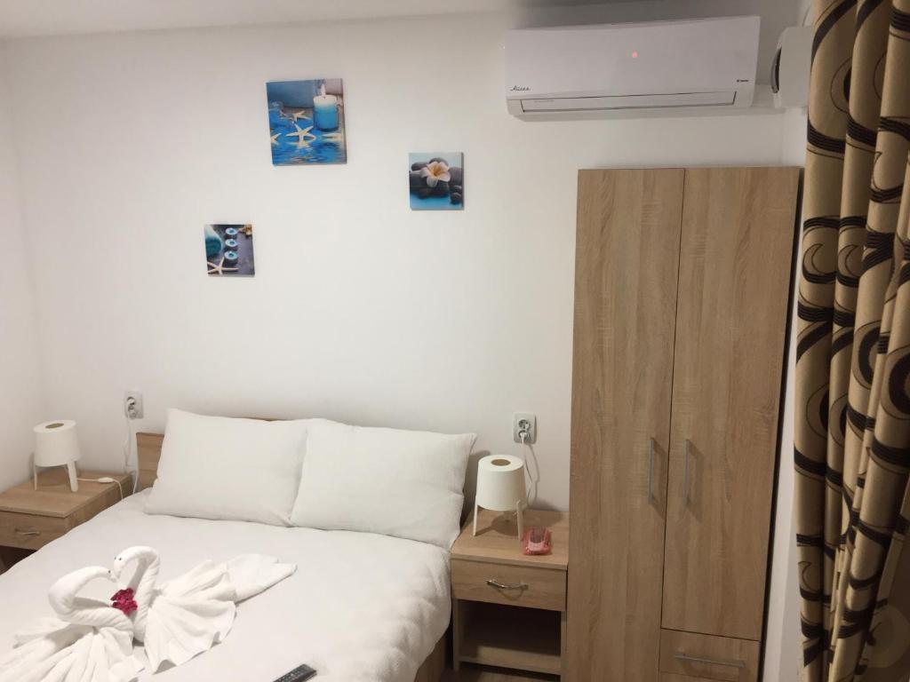 Postel nebo postele na pokoji v ubytování Casa Nicholas