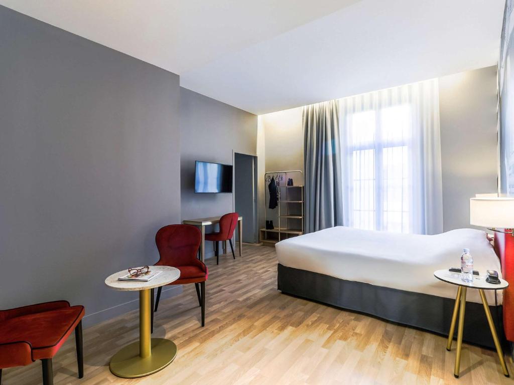 Postel nebo postele na pokoji v ubytování Ibis Styles Toulouse Capitole