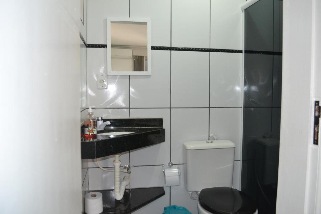  Casa com garagem e churrasqueira a 5 minutos da Praia Grande