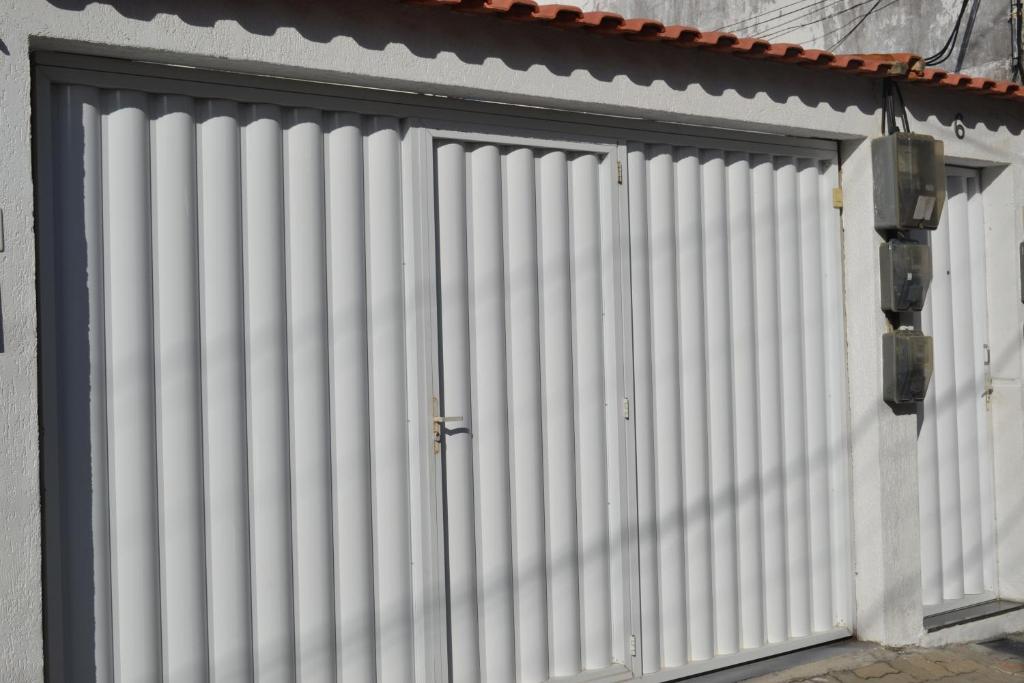  Casa com garagem e churrasqueira a 5 minutos da Praia Grande