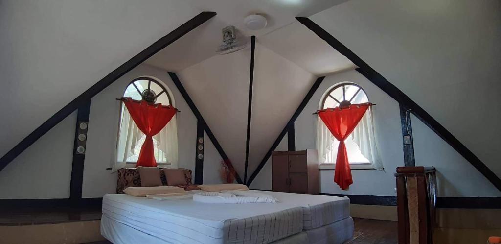 Postel nebo postele na pokoji v ubytování Isla de Paz Beach Resort