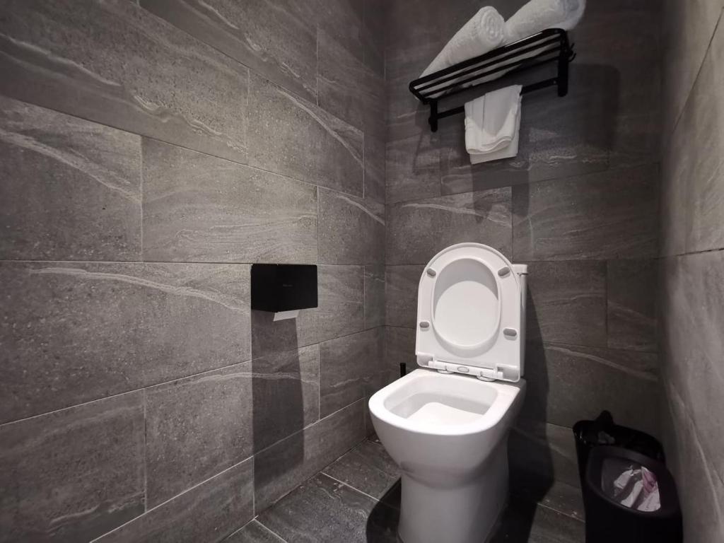 Koupelna v ubytování Oikos Poshtel