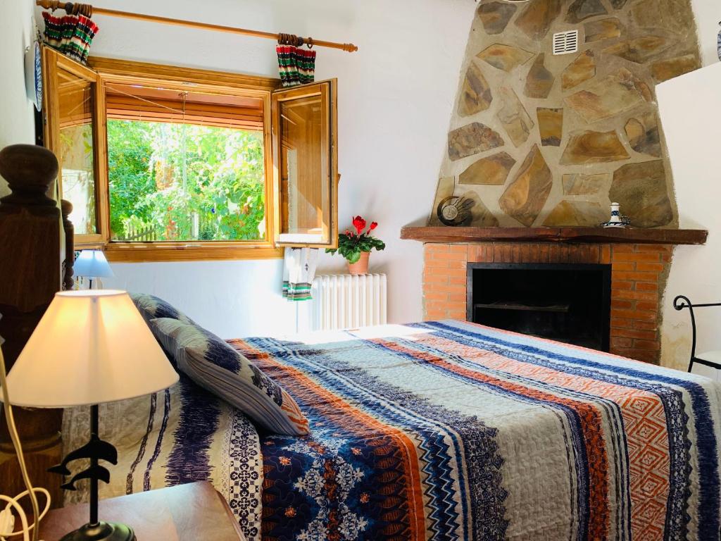 Postel nebo postele na pokoji v ubytování Barranco de la Salud