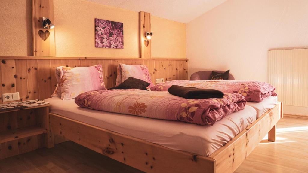 Postel nebo postele na pokoji v ubytování Haus Alpenchalet