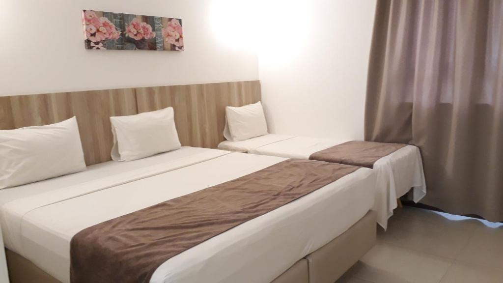 Postel nebo postele na pokoji v ubytování Pena Branca Hotel e Eventos