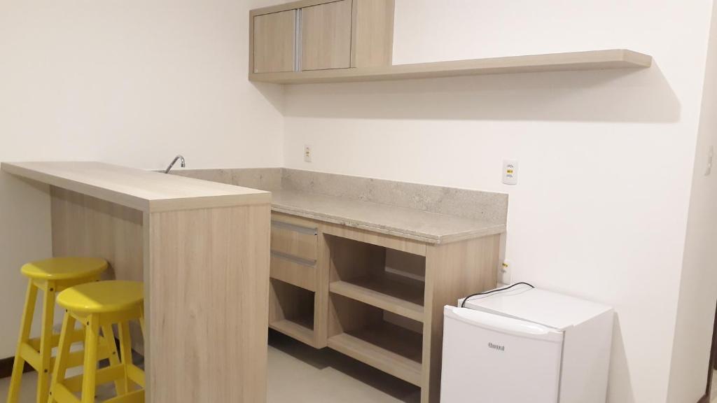 Kuchyň nebo kuchyňský kout v ubytování Pena Branca Hotel e Eventos