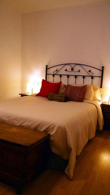 A bed or beds in a room at Casa Azahar