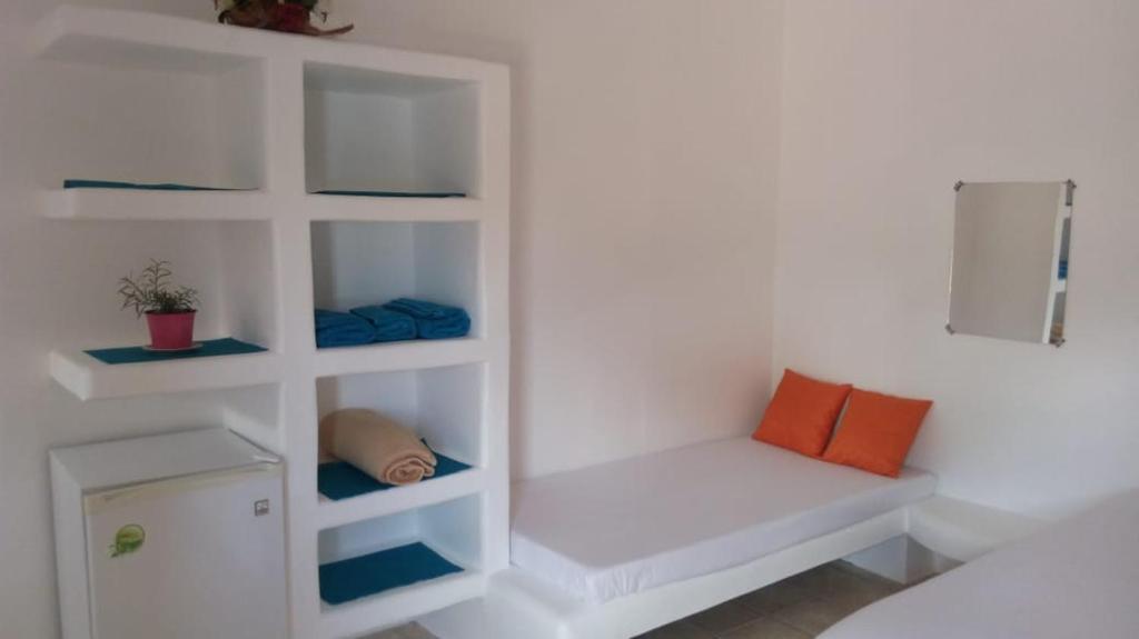 Postel nebo postele na pokoji v ubytování Rêve des Îles Guesthouse