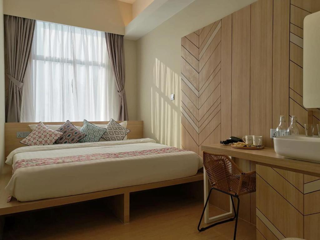 Postel nebo postele na pokoji v ubytování Oikos Poshtel