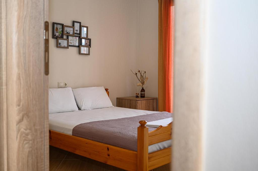 Postel nebo postele na pokoji v ubytování Anastasios Room's