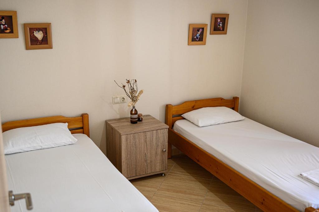 Postel nebo postele na pokoji v ubytování Anastasios Room's