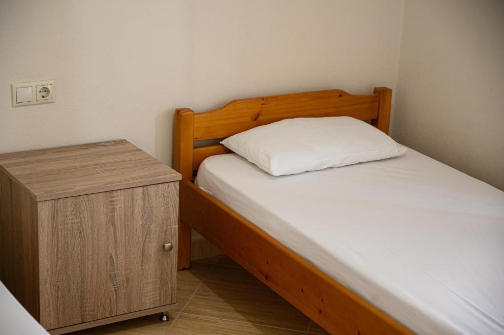 Postel nebo postele na pokoji v ubytování Anastasios Room's