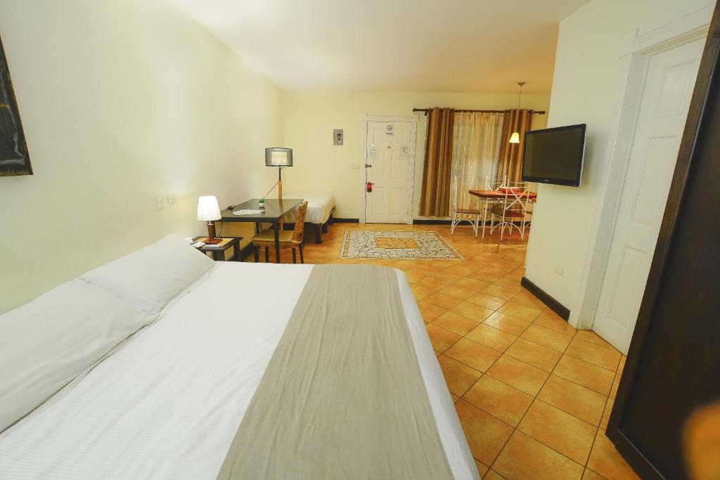 TV a/nebo společenská místnost v ubytování Hotel Luisiana