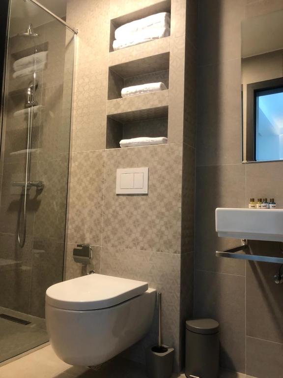 Koupelna v ubytování Qama Hotel