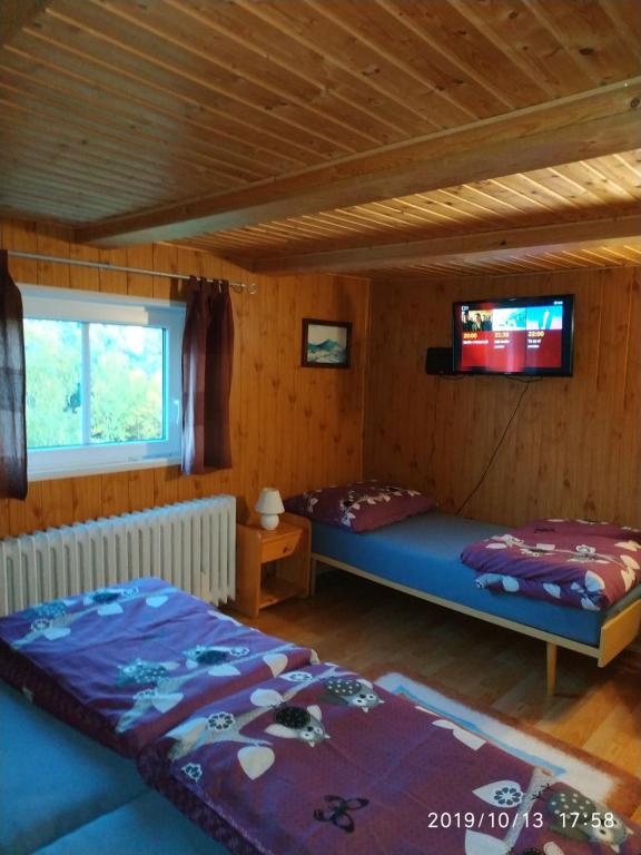 Postel nebo postele na pokoji v ubytování Pension Panorama