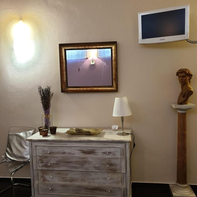 TV a/nebo společenská místnost v ubytování B&B Il Rustico