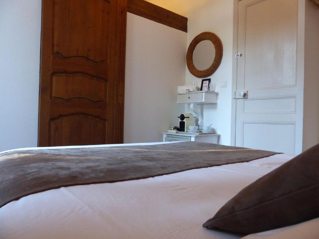 Postel nebo postele na pokoji v ubytování Le Moulin de Varrians