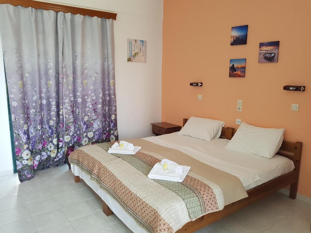 Postel nebo postele na pokoji v ubytování Stars Hotel