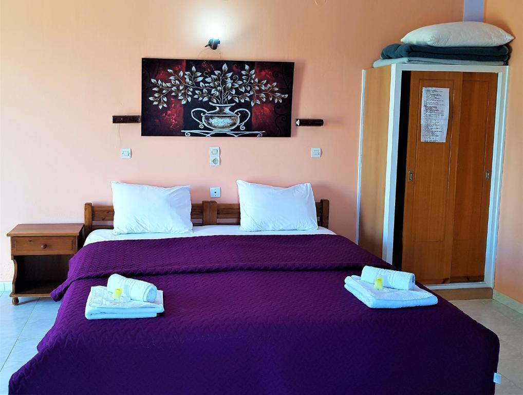 Postel nebo postele na pokoji v ubytování Stars Hotel