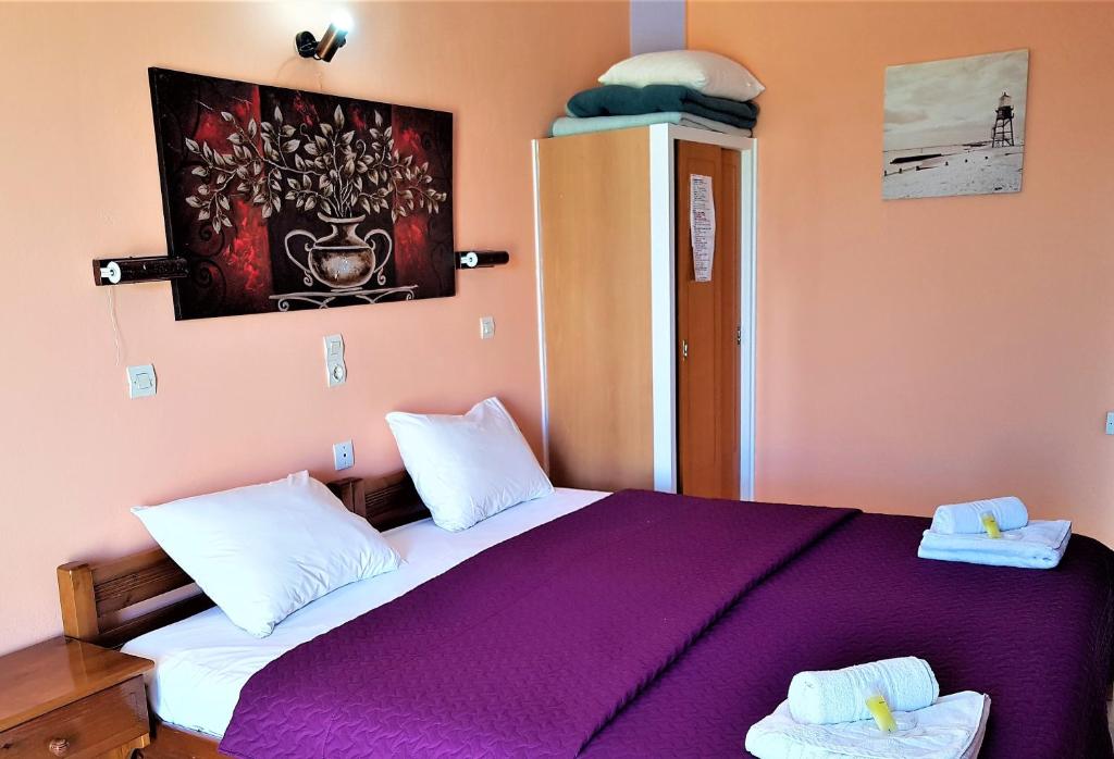 Postel nebo postele na pokoji v ubytování Stars Hotel