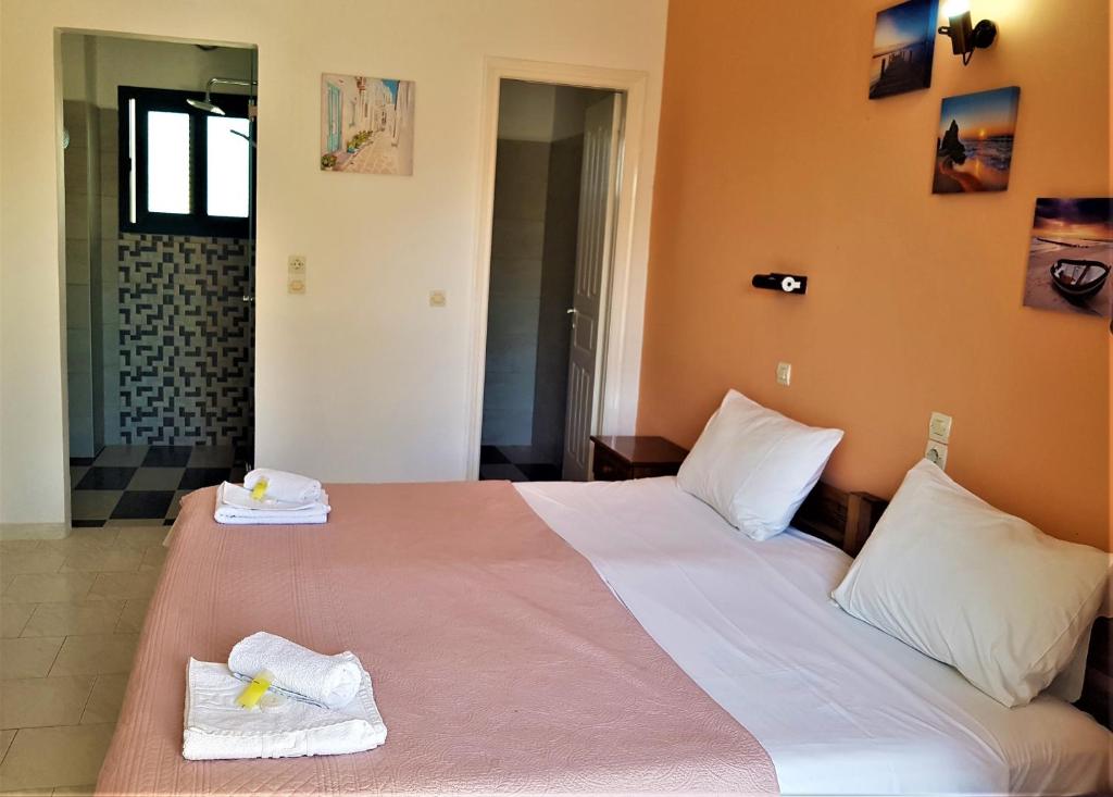 Postel nebo postele na pokoji v ubytování Stars Hotel