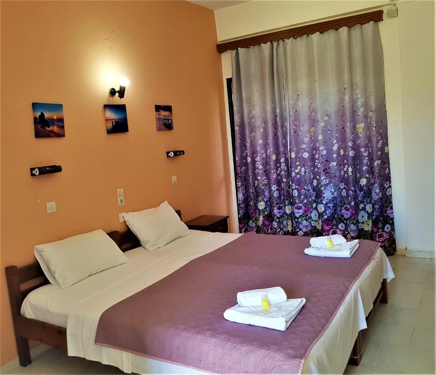 Postel nebo postele na pokoji v ubytování Stars Hotel