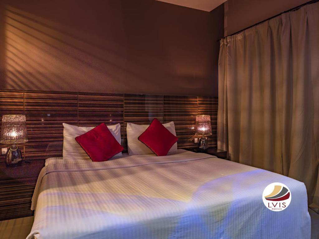 Postel nebo postele na pokoji v ubytování LVIS blancura Hotel