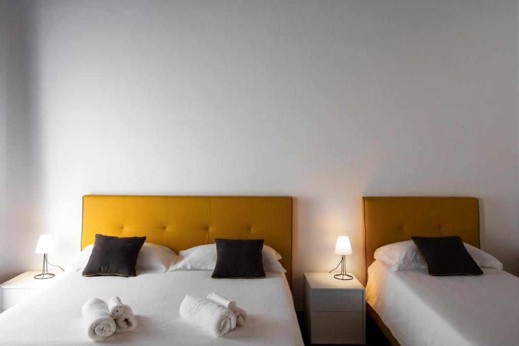 Postel nebo postele na pokoji v ubytování Interamnia Boutique Hotel