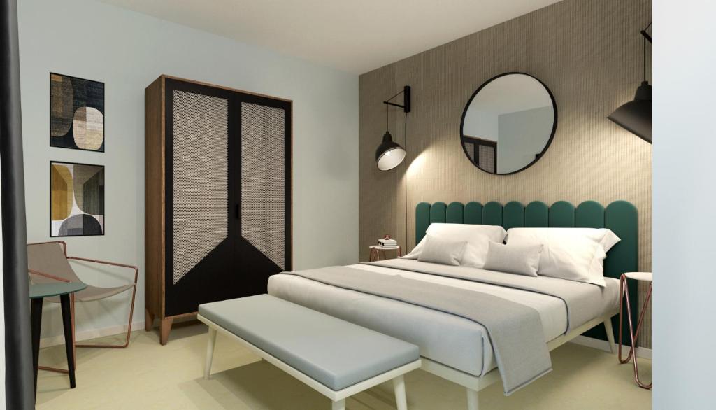 A bed or beds in a room at Hotel Europa