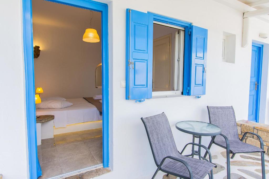 Postel nebo postele na pokoji v ubytování Mykonos Vouniotis Rooms