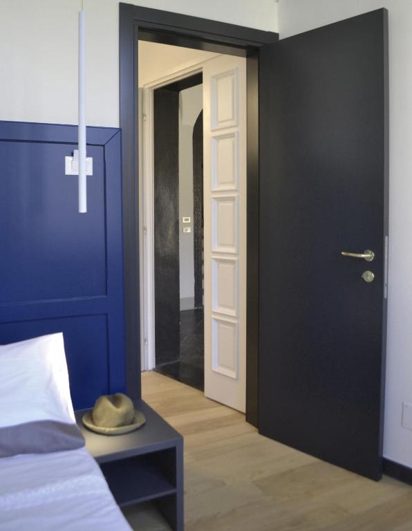 Postel nebo postele na pokoji v ubytování Da Domè Charm Rooms